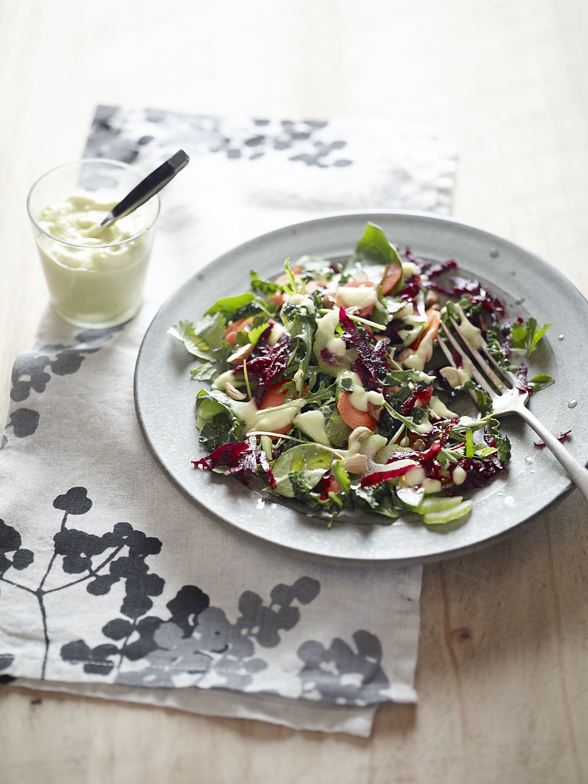Super green salad with avocado dressing